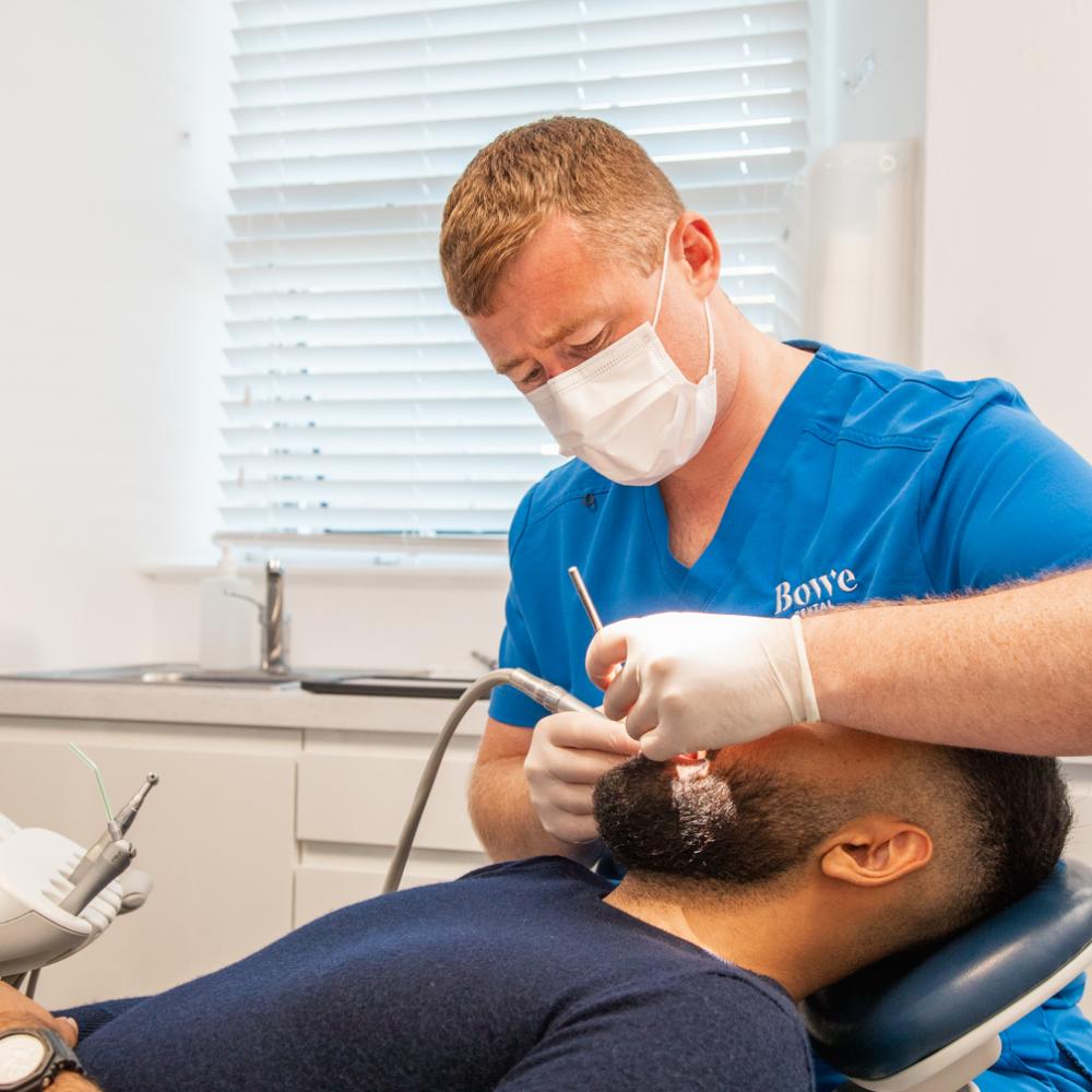 Dr Power with a patient
